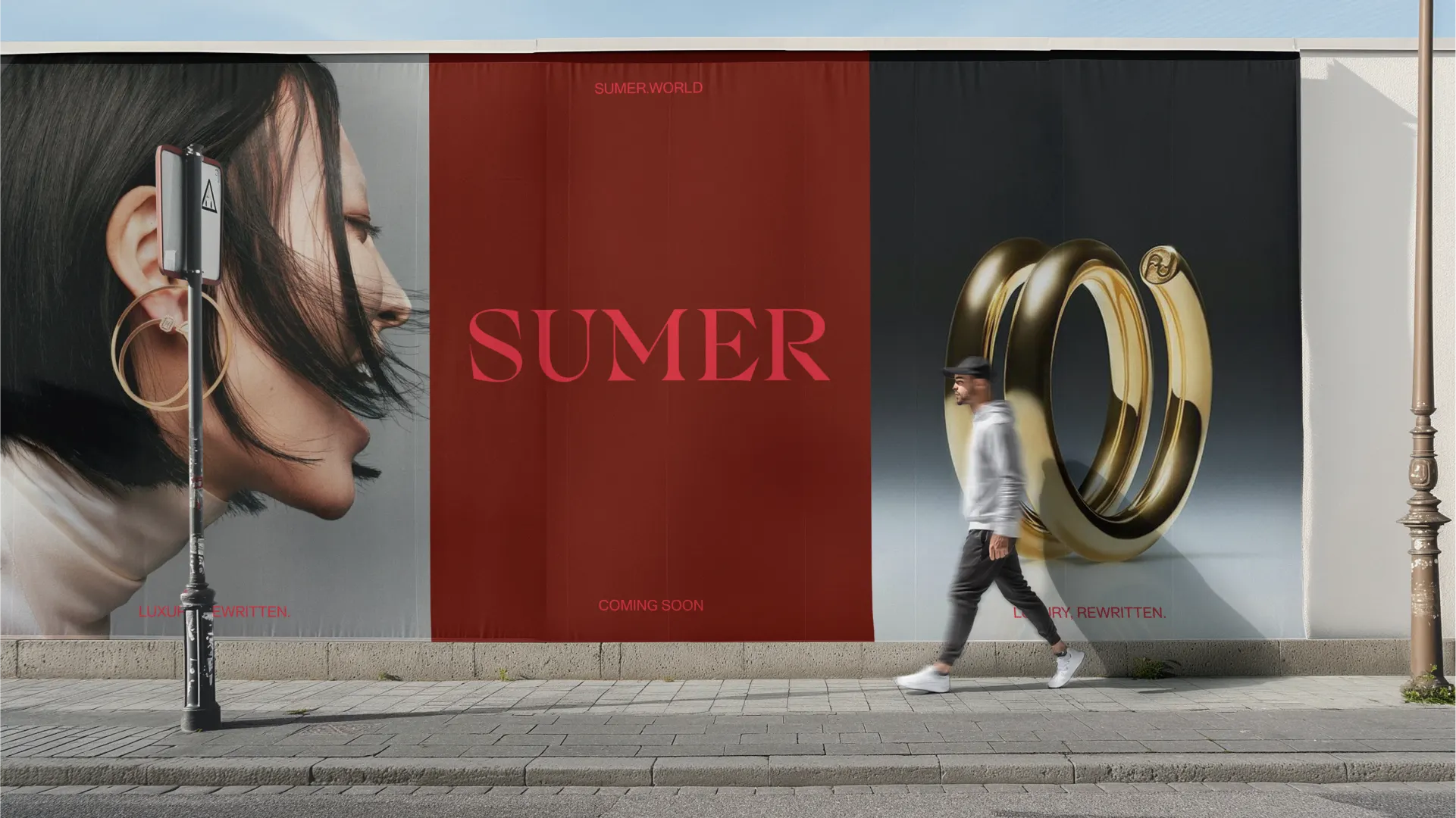 Sumer street billboards with a model and a gold ring, and passers-by on the sidewalk